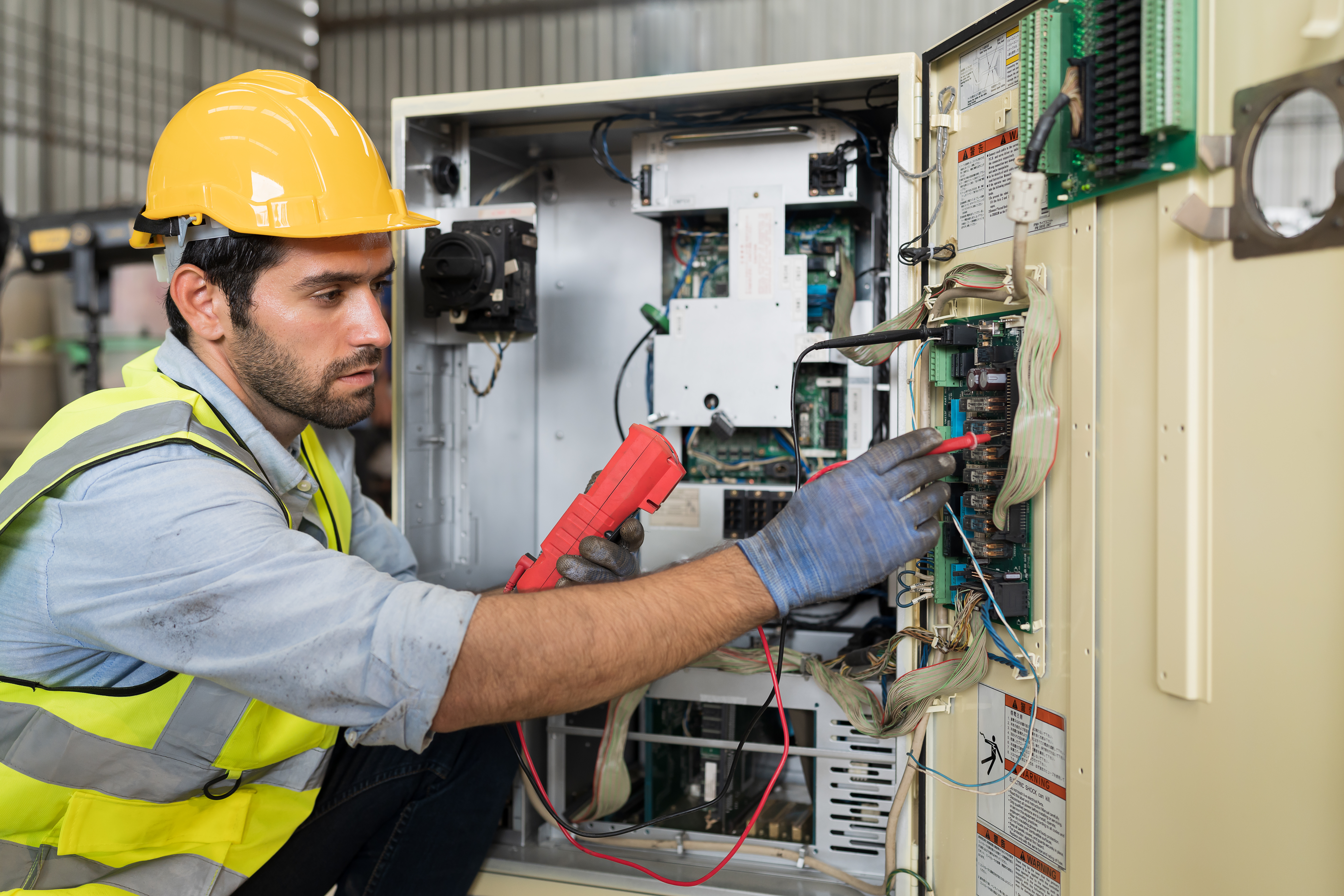 Male electrician worker checking, repair, maintenance operation